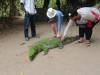Stroking Charlie the croc at the crocodile pool